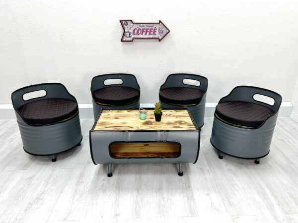 Graue Upcycling Sitzgruppe: Sessel "Lou" mit Polstern und Couchtisch "Nele" aus Oelfaessern