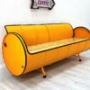 XXL Upcycling Sofa "Jane" in Gelb – Nachhaltiges Retro Oelfass Sofa mit Holz-Sitzflaeche