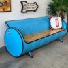 Stylisches hellblaues Tonnenmöbel Sofa 'Joy' aus Ölfass im Wohnzimmer
